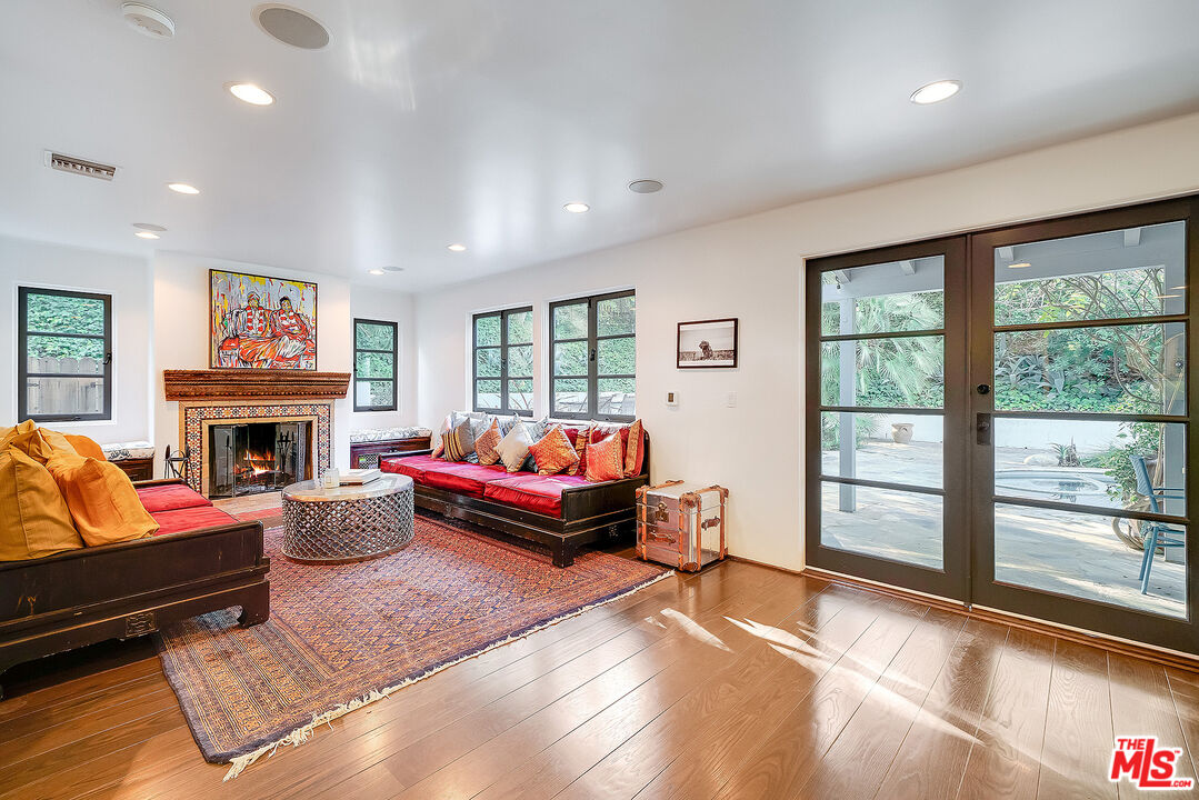 11670 Duque Drive Studio City, CA 91604 - Photo 8 of 48 a living room with furniture and a fireplace