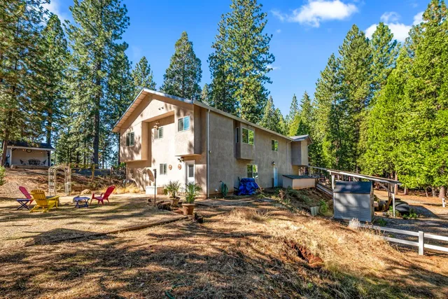 a view of a field with an outdoor space