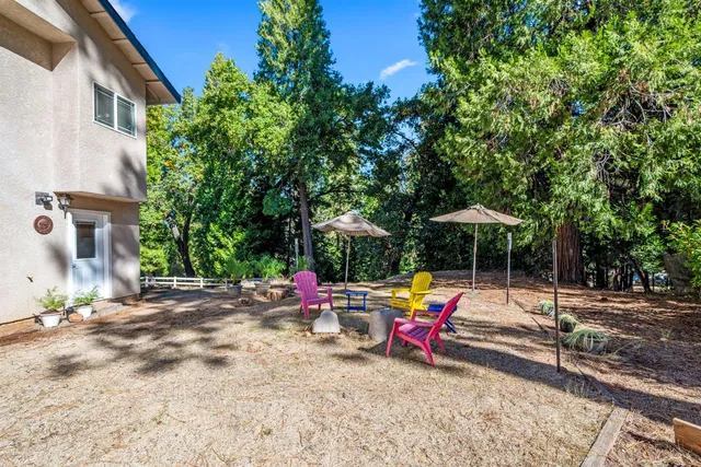 an aerial view of residential house and green space