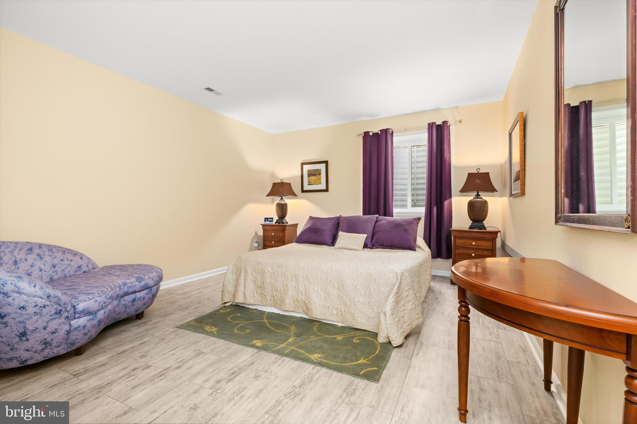 35224 Seaport Loop Lewes, DE 19958 - Photo 33 of 45 Cozy bedroom with warm, inviting tones.