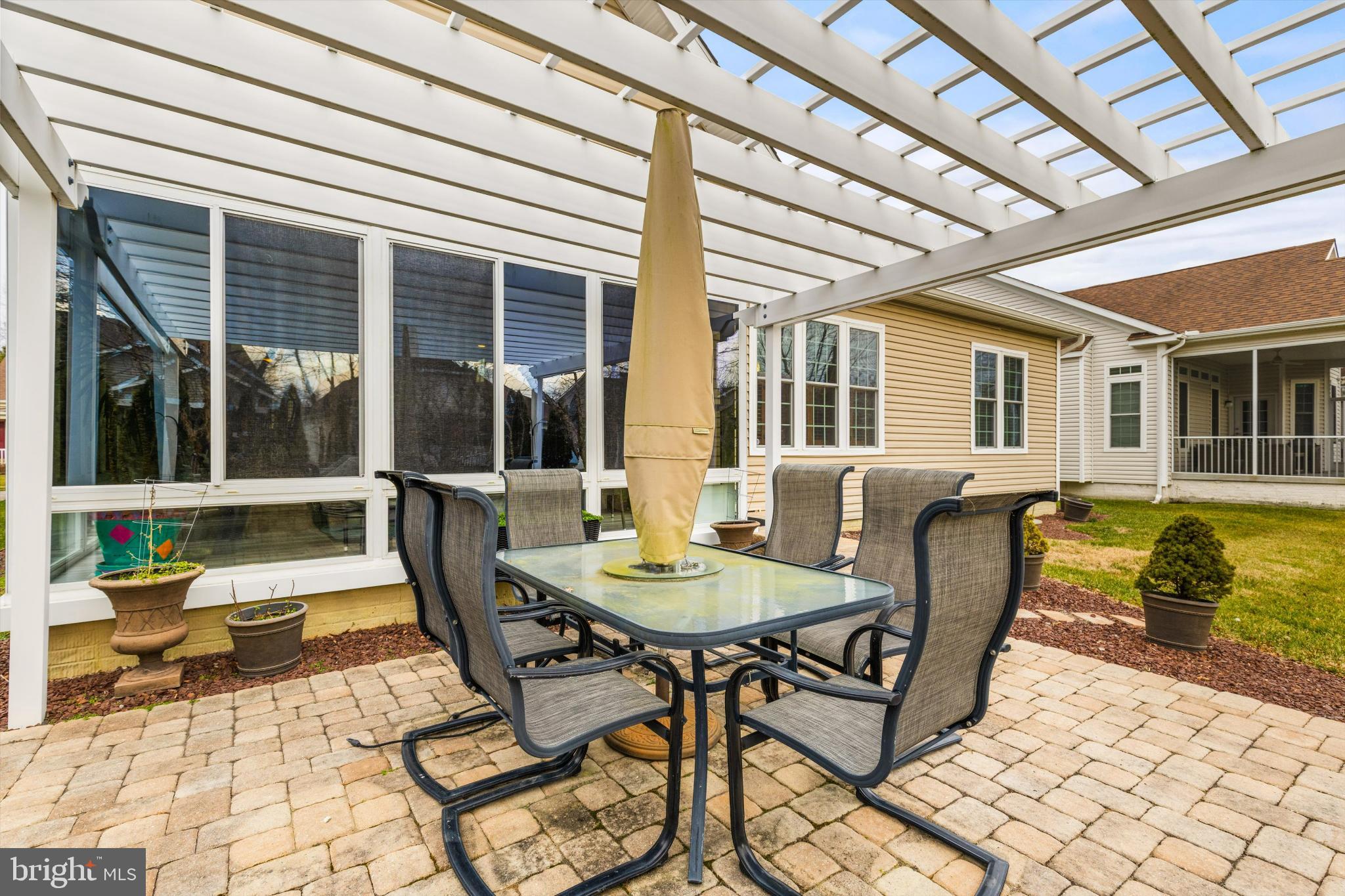 35224 Seaport Loop Lewes, DE 19958 - Photo 35 of 45 Charming patio oasis for outdoor gatherings.