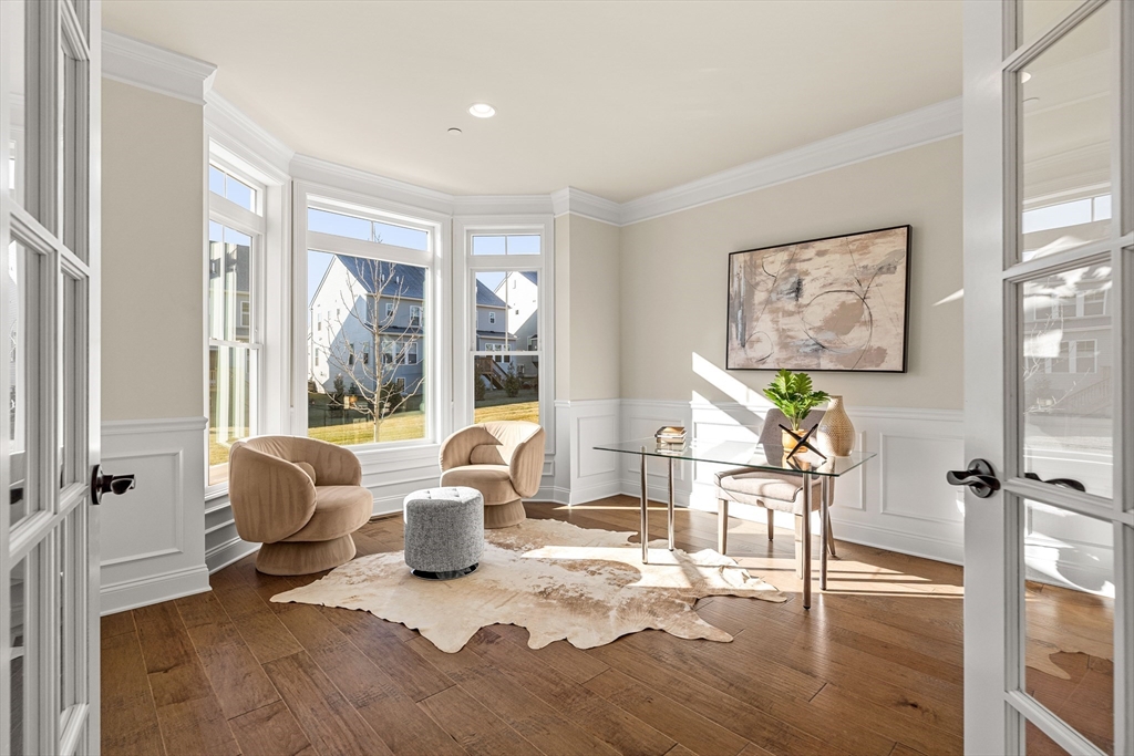 24 Rookery Lane, Unit 6 Concord, MA 01742 - Photo 15 of 41 a living room with furniture and a window