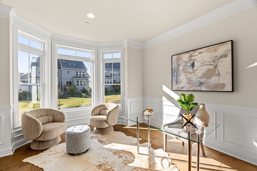 24 Rookery Lane, Unit 6 Concord, MA 01742 - Photo 16 of 41 a living room with furniture and a large window
