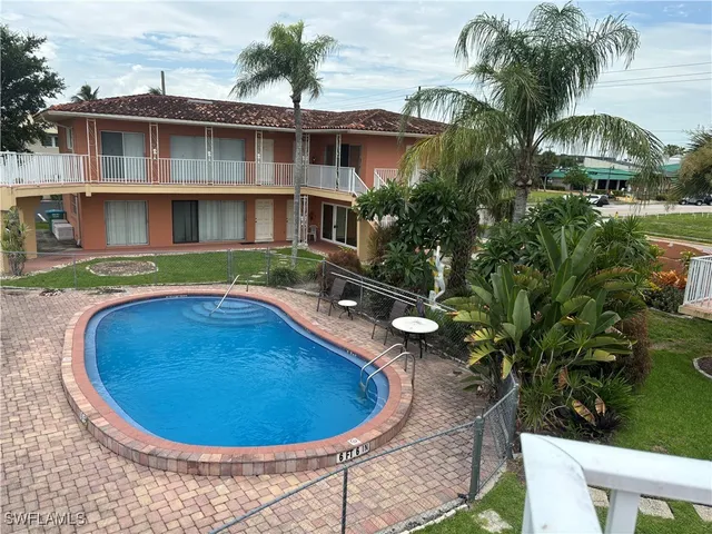a view of a house with a swimming pool