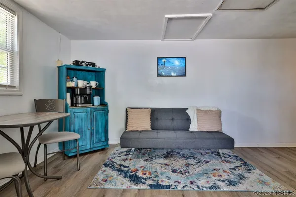 a kitchen with stainless steel appliances a refrigerator sink and cabinets
