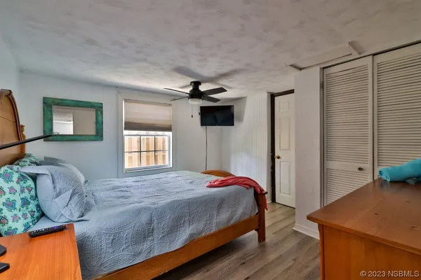 a dining room with furniture and a window