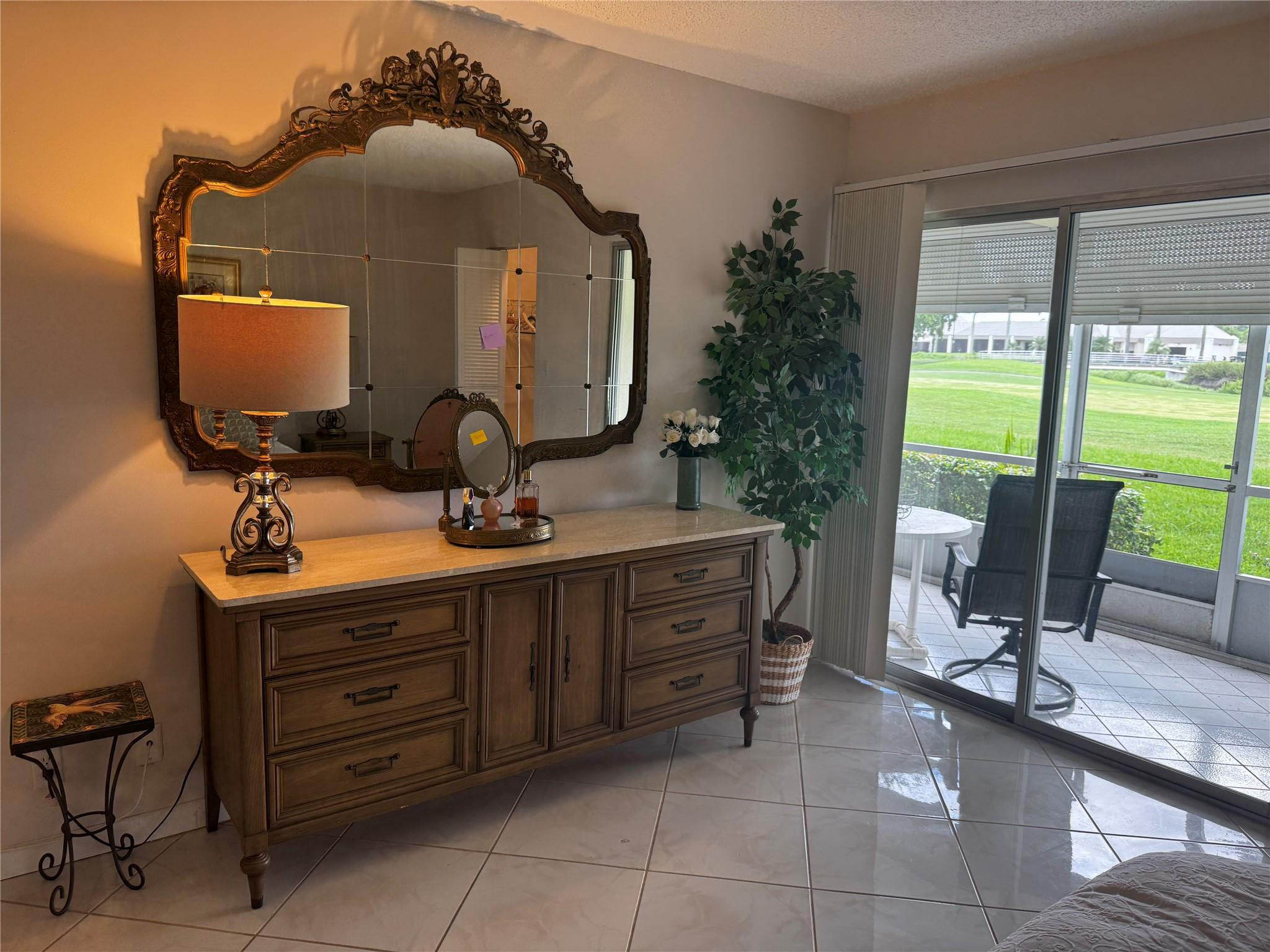 3302 Aruba Way, Unit M1 Coconut Creek, FL 33066 - Photo 17 of 58 a bathroom with a sink and a mirror