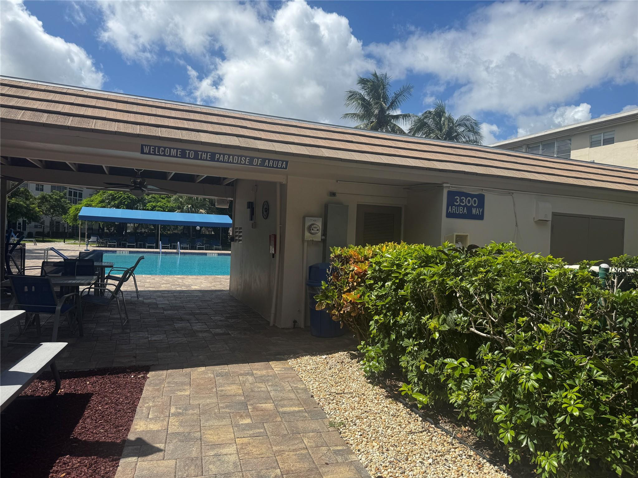 3302 Aruba Way, Unit M1 Coconut Creek, FL 33066 - Photo 22 of 58 a view of a house with a patio