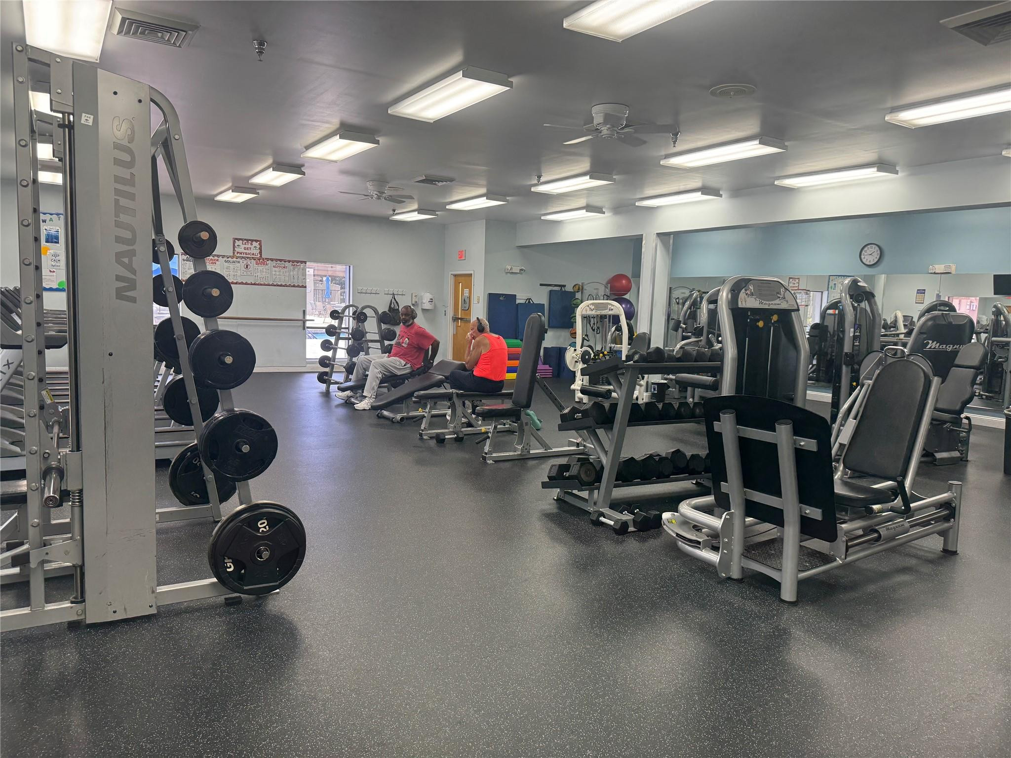 3302 Aruba Way, Unit M1 Coconut Creek, FL 33066 - Photo 35 of 58 a view of a room with gym equipment