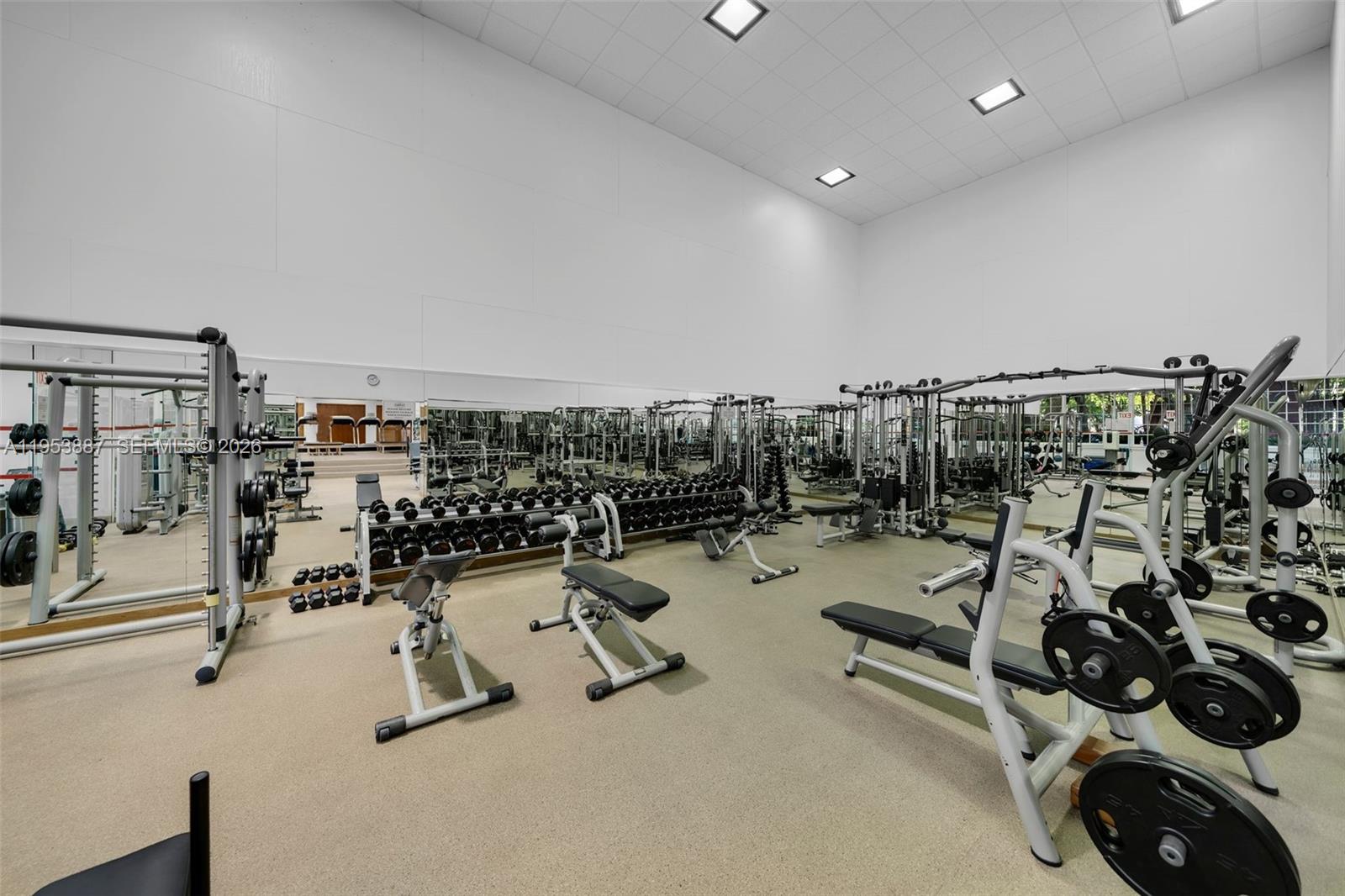 2000 Towerside Terrace, Unit 608 Miami, FL 33138 - Photo 32 of 44 a view of a room with gym equipment