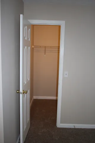 an empty room with a door