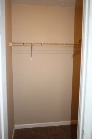 a view of small space with racks on the wall