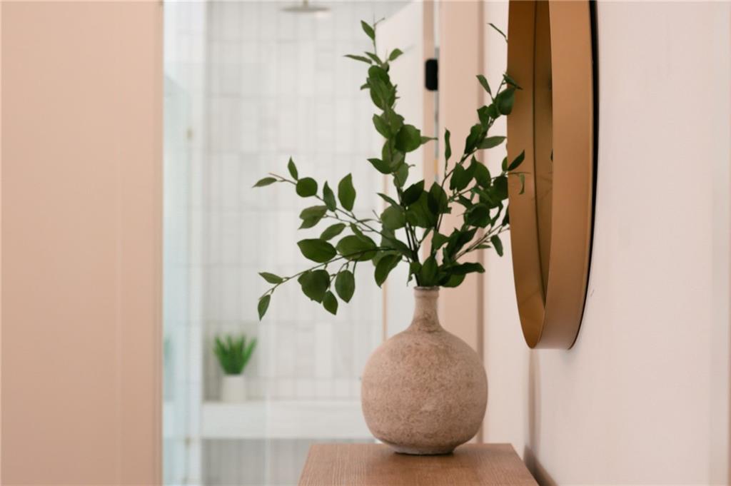 581 Sherwood Road Northeast Atlanta, GA 30324 - Photo 26 of 92 a white vase with white and yellow flowers