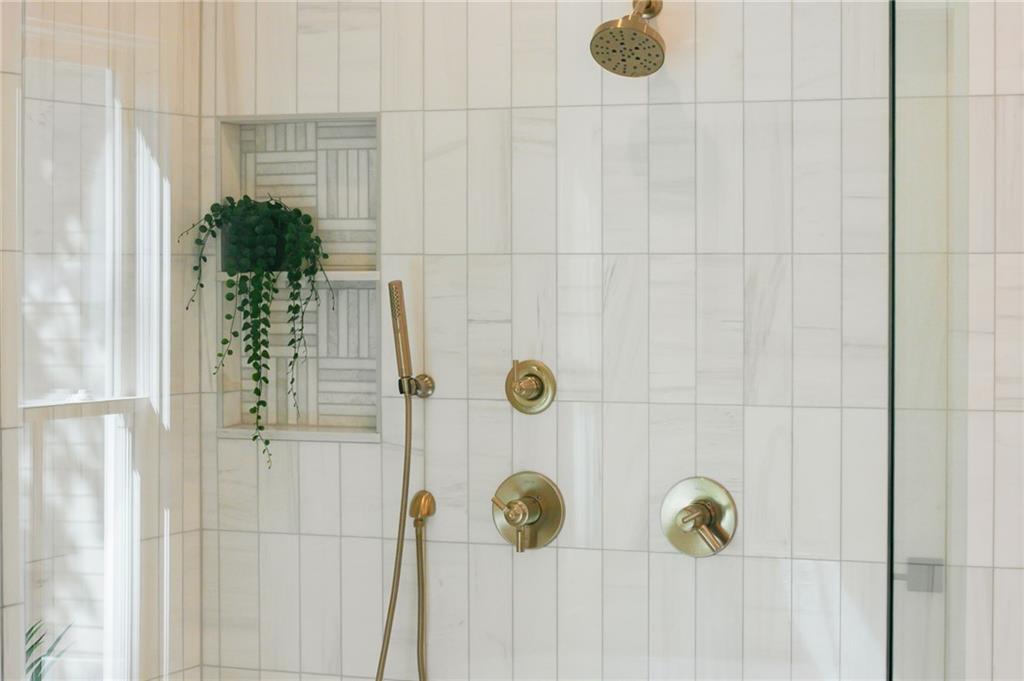 581 Sherwood Road Northeast Atlanta, GA 30324 - Photo 28 of 92 a bathroom with a shower