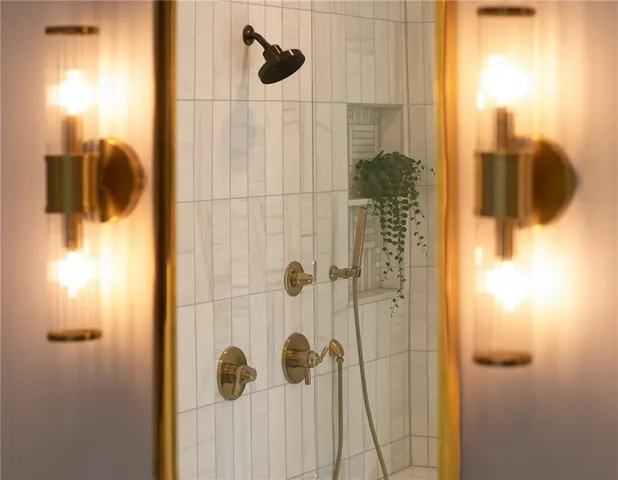 a bathroom with sink and mirror