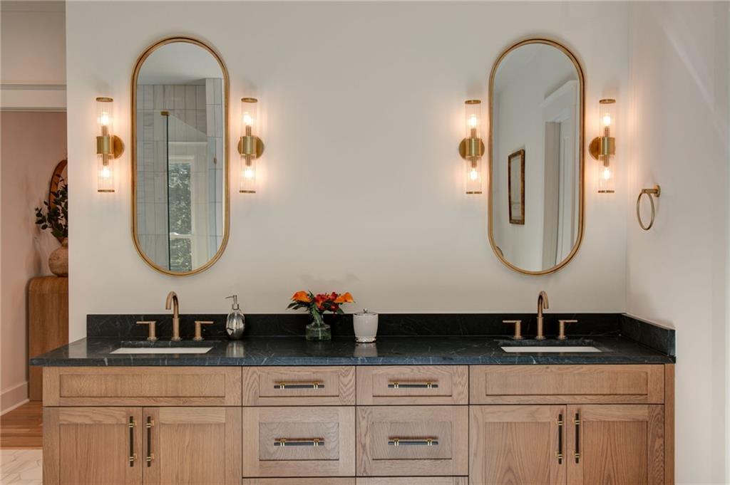 581 Sherwood Road Northeast Atlanta, GA 30324 - Photo 31 of 92 a bathroom with sink and mirror