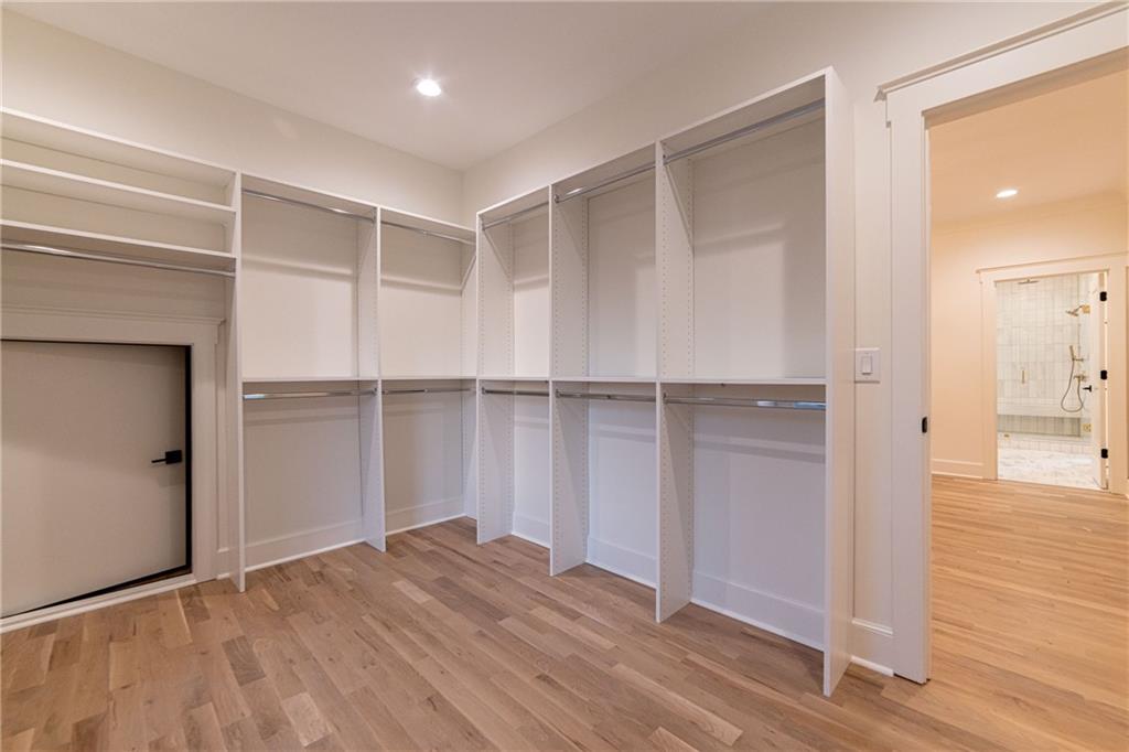 581 Sherwood Road Northeast Atlanta, GA 30324 - Photo 39 of 92 a view of empty room with wooden floor