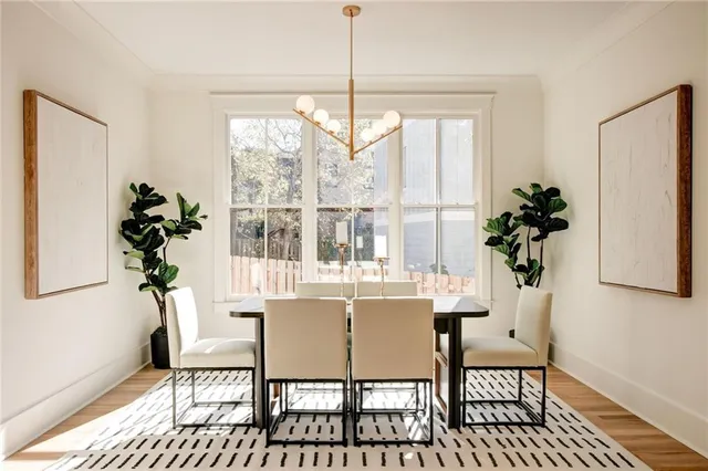 a view of kitchen with furniture and a potted plant