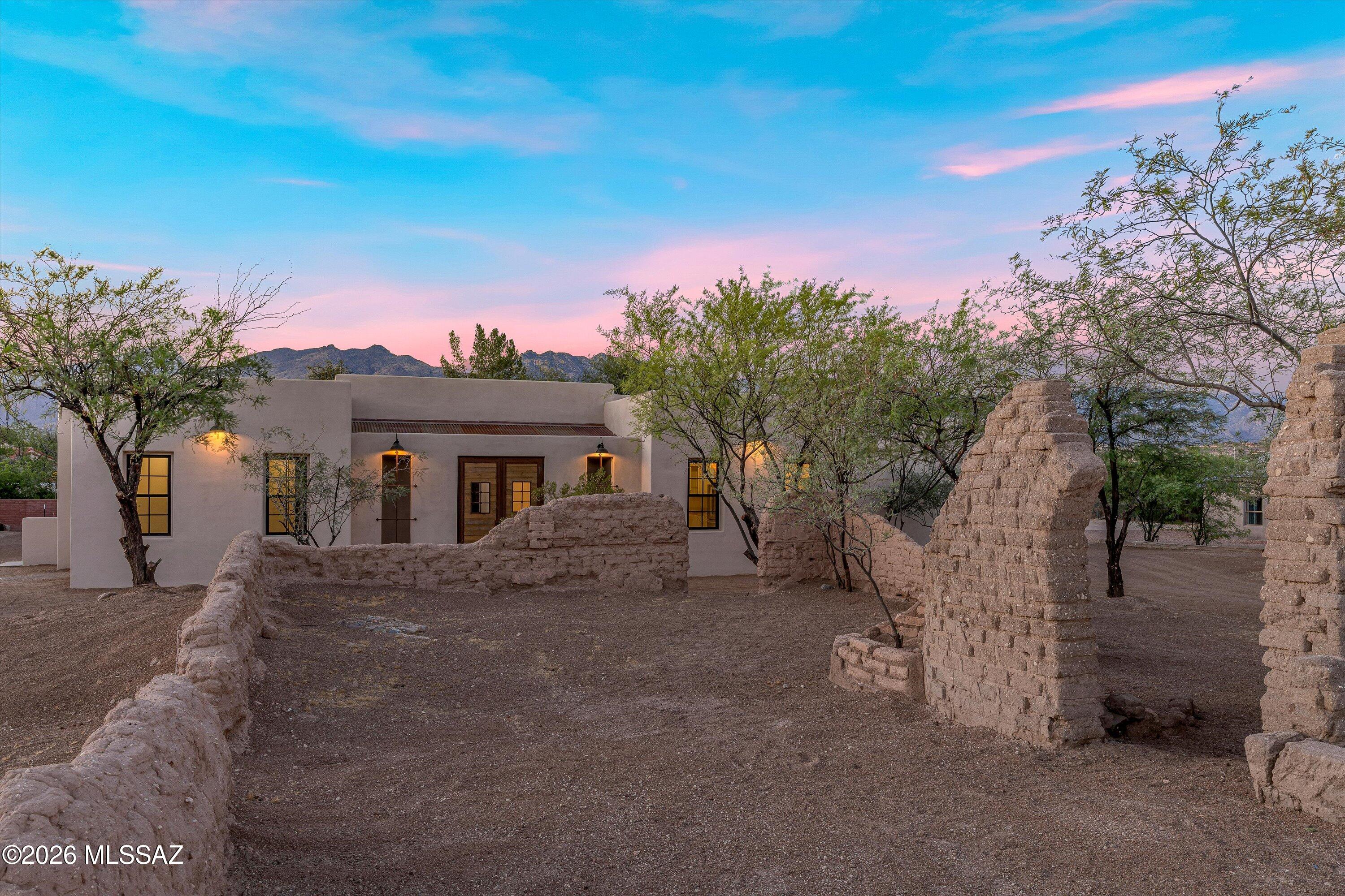 5259 East Fort Lowell Road Tucson, AZ 85712 - Photo 43 of 50 a front view of a house with a yard