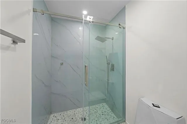 a view of porch with a floor to ceiling window and a yard