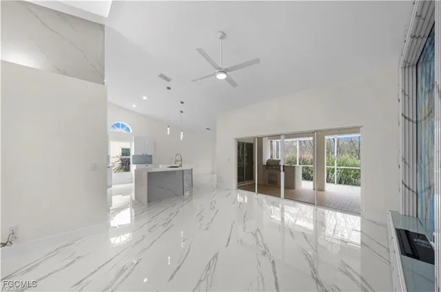 a view of an empty room with glass door