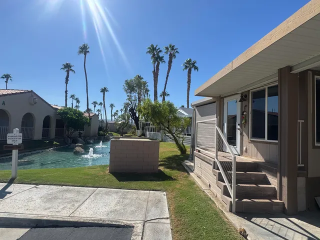 a house view with a garden space
