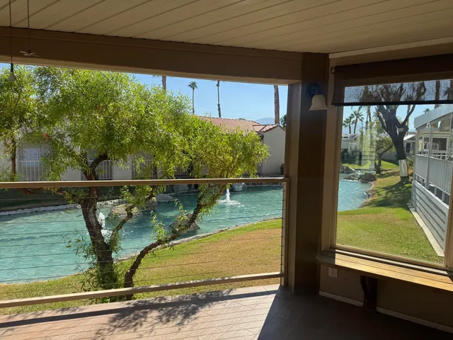 a view of a balcony with lake view
