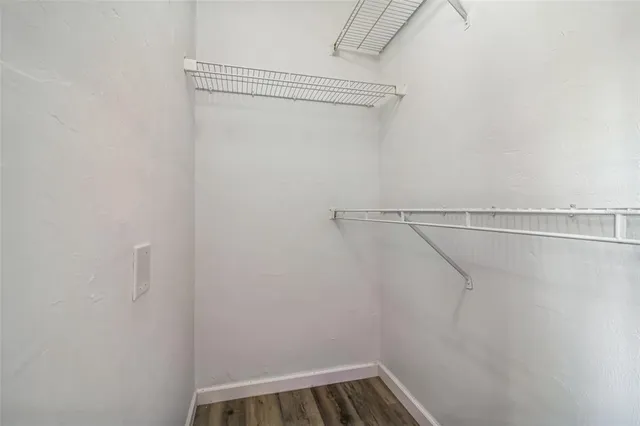 a view of a room with racks on the wall