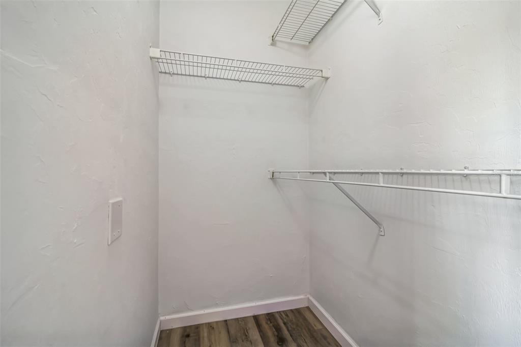 3800 Southwest 20th Avenue, Unit 112 Gainesville, FL 32607 - Photo 15 of 18 a view of a room with racks on the wall