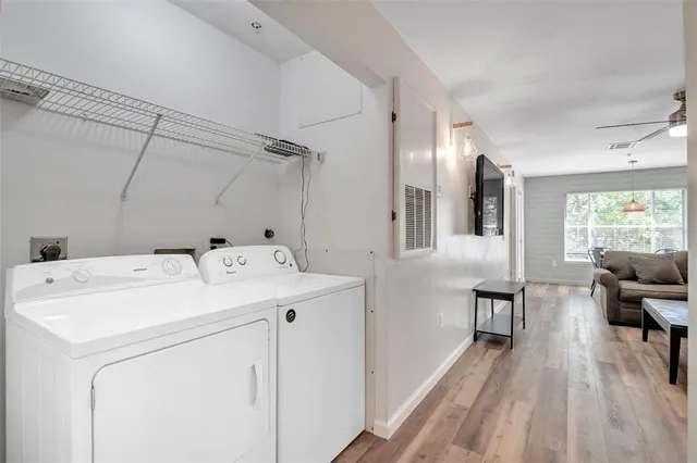 a utility room with dryer and washer