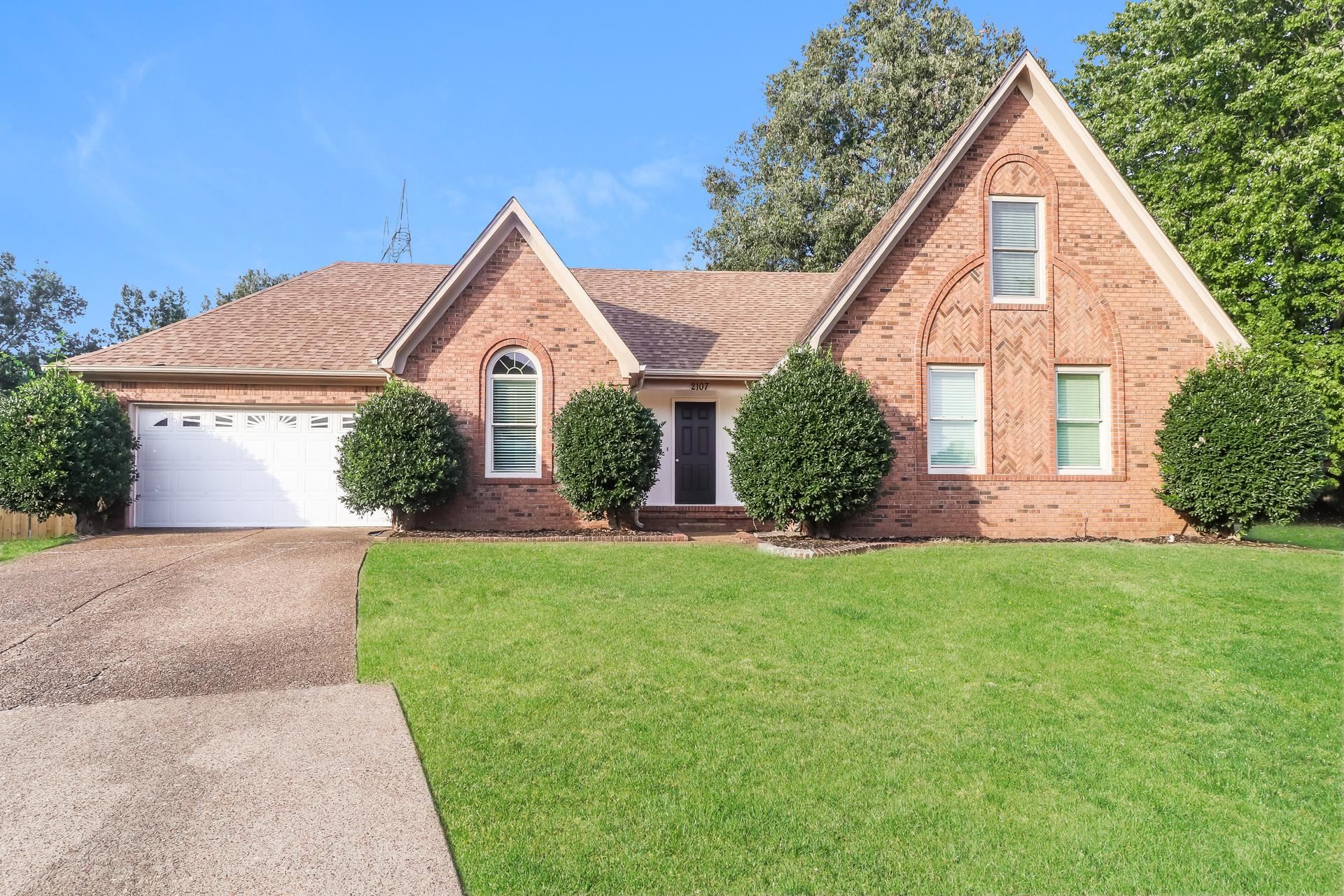 a view of outdoor space yard and front view of a house