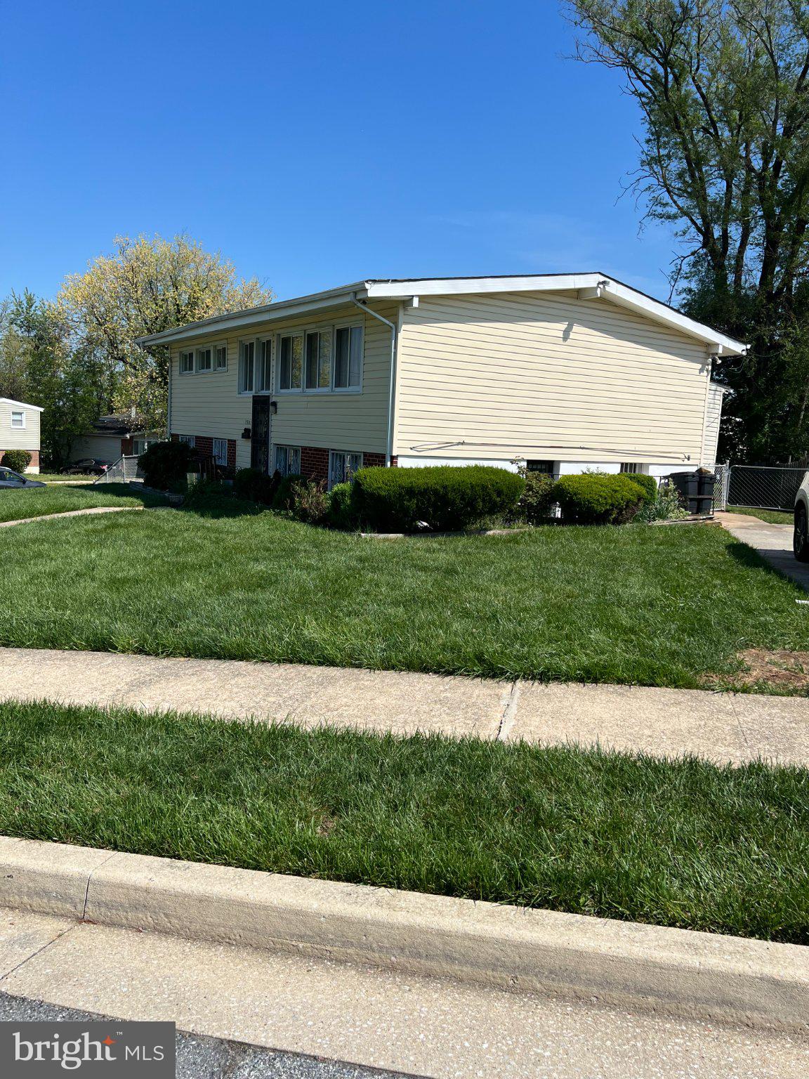 3501 Sedgemoor Road Baltimore, MD 21207 - Photo 2 of 5 Charming home with lush green lawn.