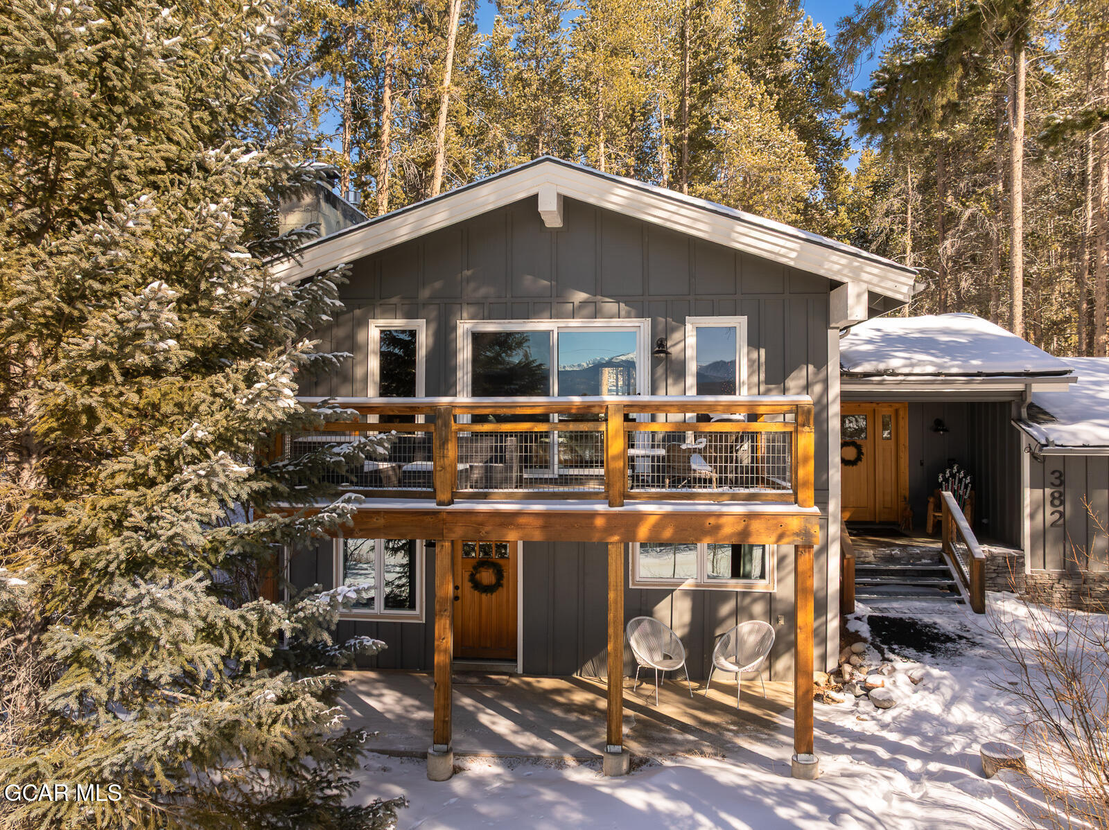 382 County Road 837 Fraser, CO 80442 - Photo 1 of 46 a front view of a house with balcony