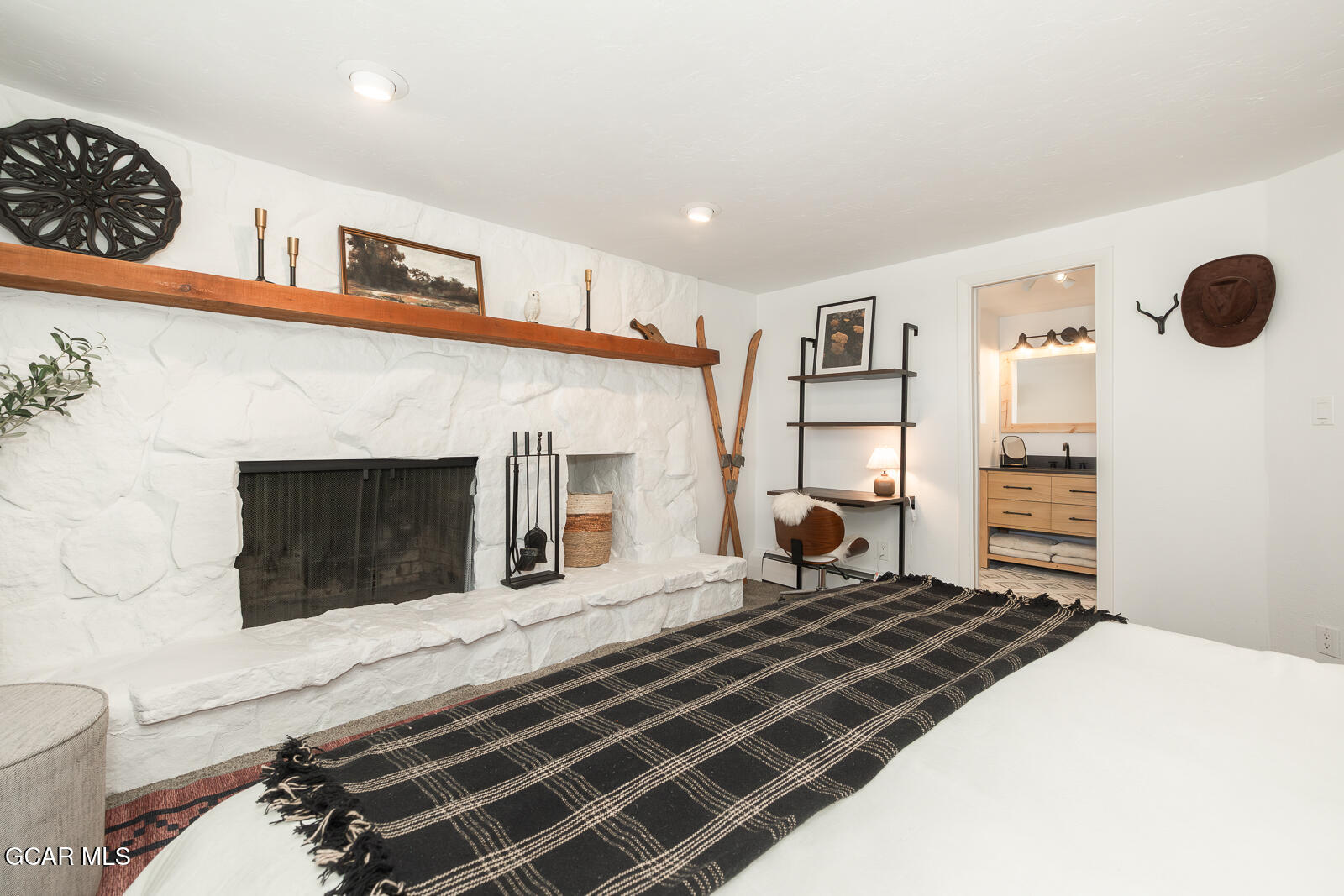 382 County Road 837 Fraser, CO 80442 - Photo 22 of 46 a living room with stainless steel appliances furniture a fireplace and a window