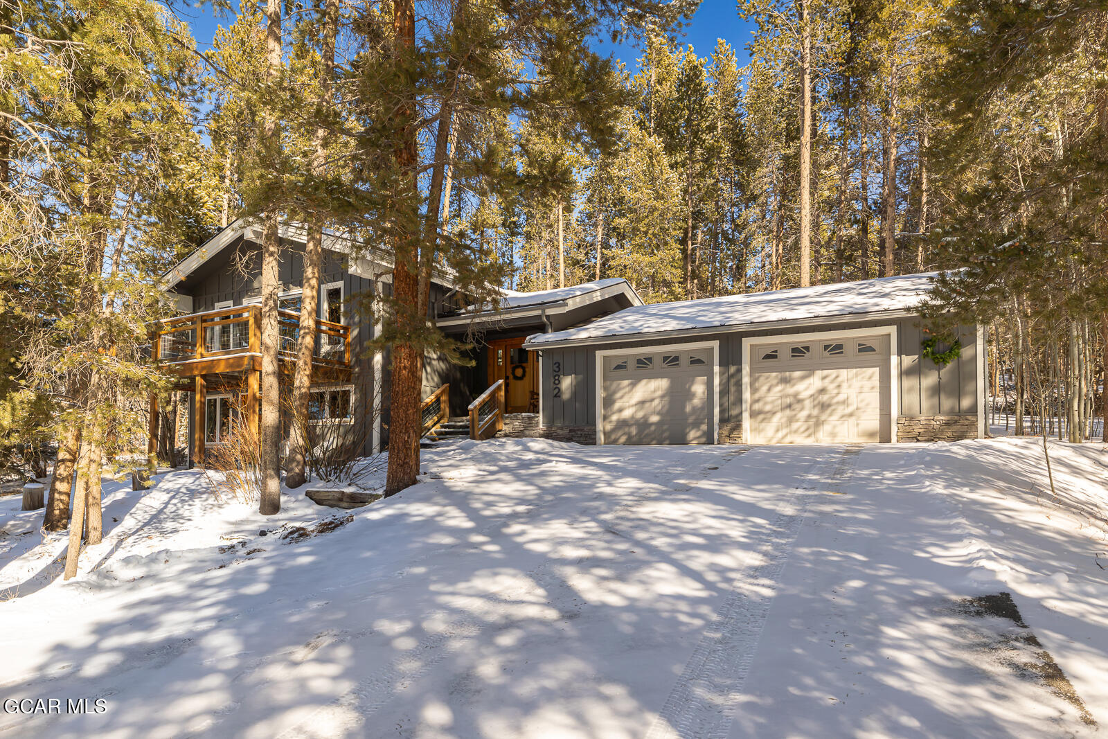 382 County Road 837 Fraser, CO 80442 - Photo 42 of 46 a front view of a house with a garden