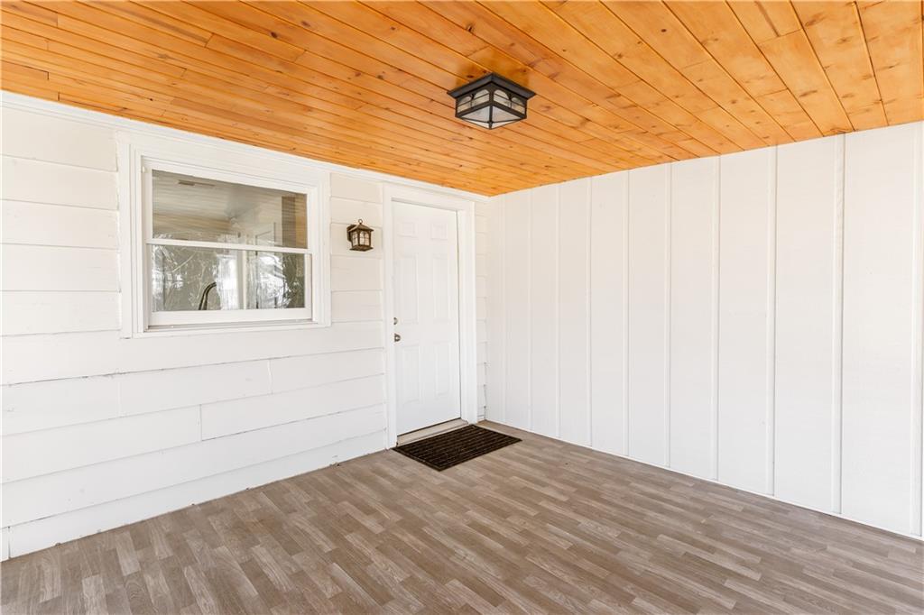 2260 Old Spring Road Smyrna, GA 30080 - Photo 14 of 29 a view of empty room with wooden floor and fan
