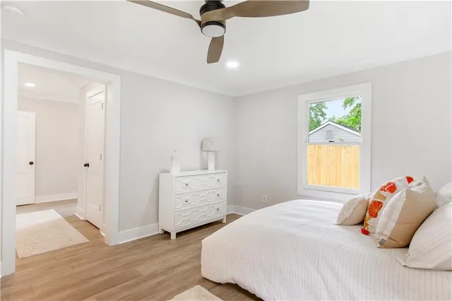 a bedroom with a bed and a cabinets