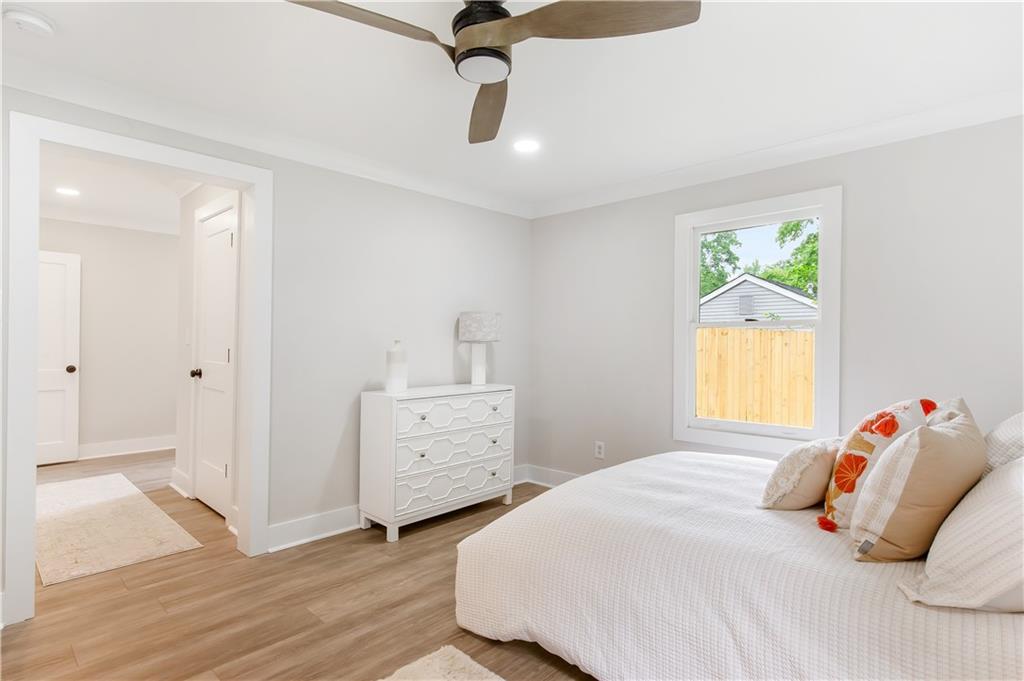 2260 Old Spring Road Smyrna, GA 30080 - Photo 19 of 29 a bedroom with a bed and a cabinets