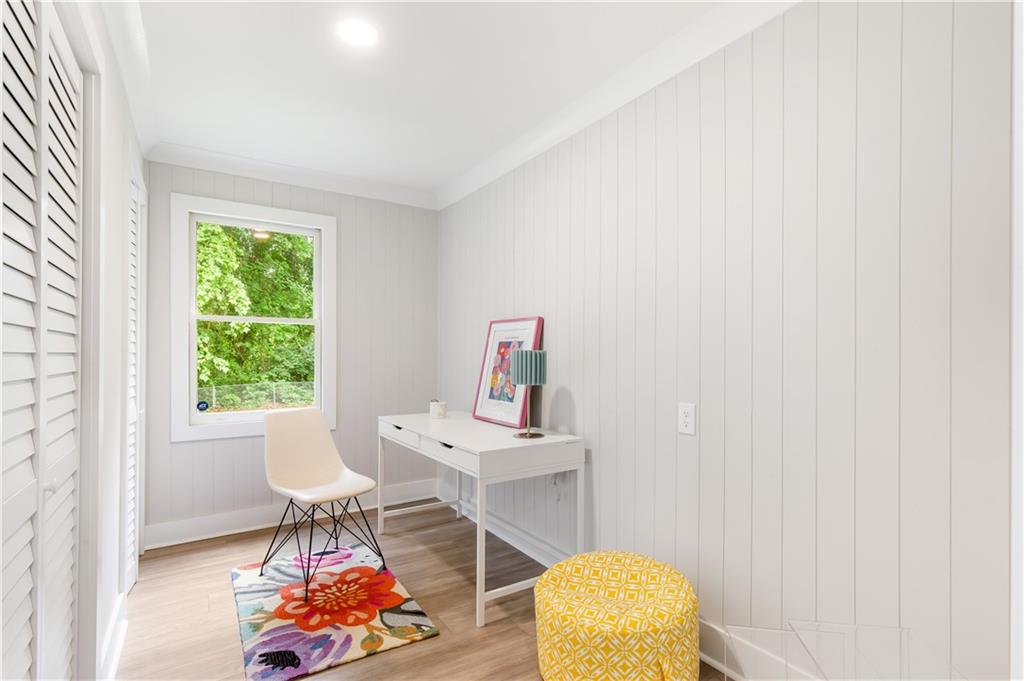 2260 Old Spring Road Smyrna, GA 30080 - Photo 27 of 29 a living room with furniture and a window