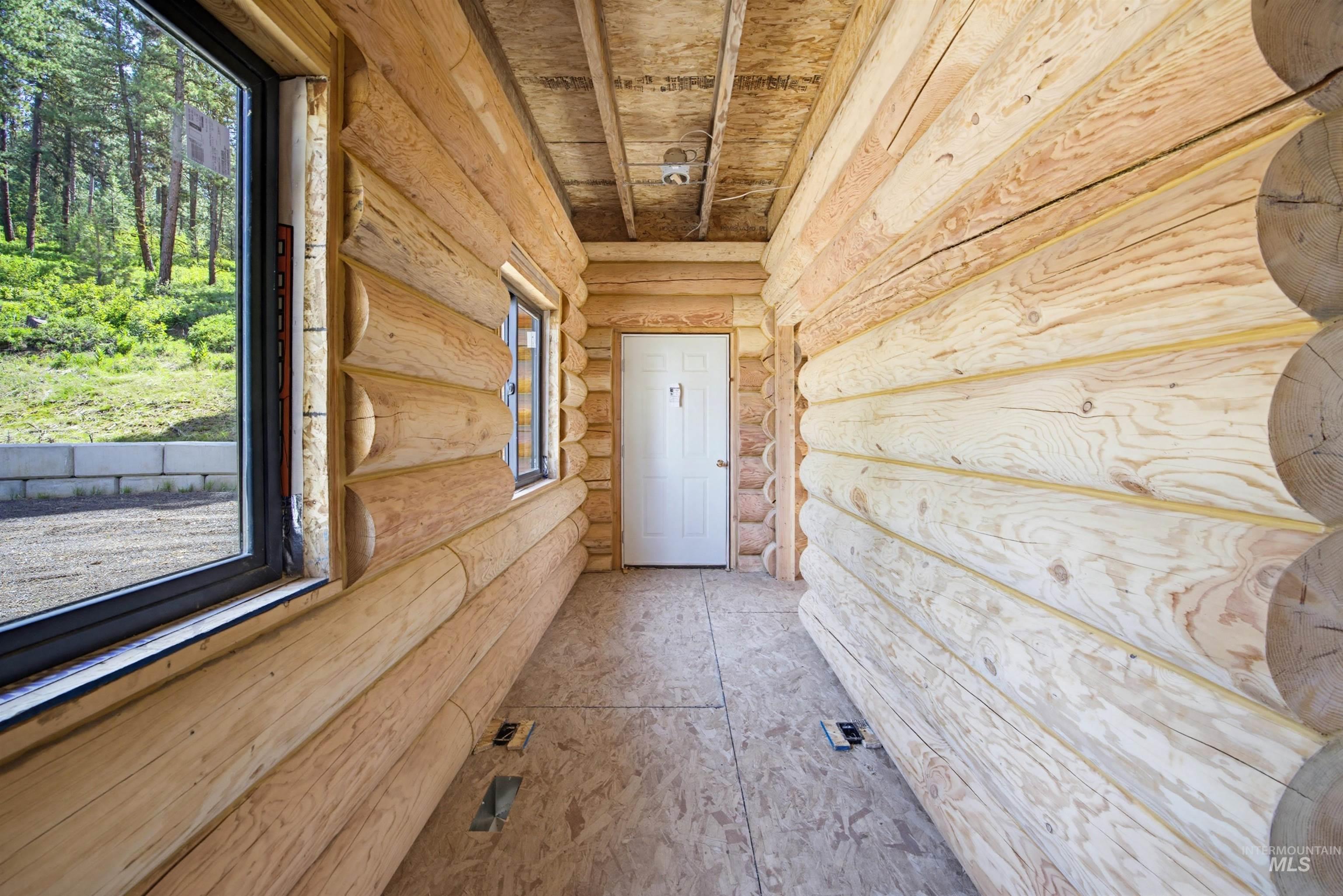 3322 Big Creek Road New Meadows, ID 83654 - Photo 44 of 50 Log cabin style construction featuring natural wood walls and exposed ceiling beams