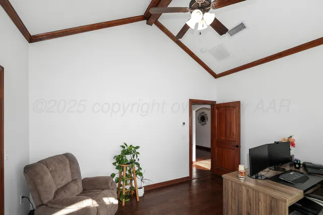 a workspace with furniture and wooden floor