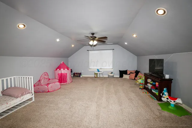 a view of a room with toys and a window