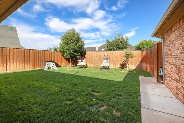 a view of garden with swimming pool