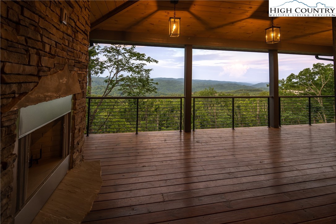 371 Ninebark Road Boone, NC 28607 - Photo 14 of 41 a view of a floor to ceiling window with wooden floor