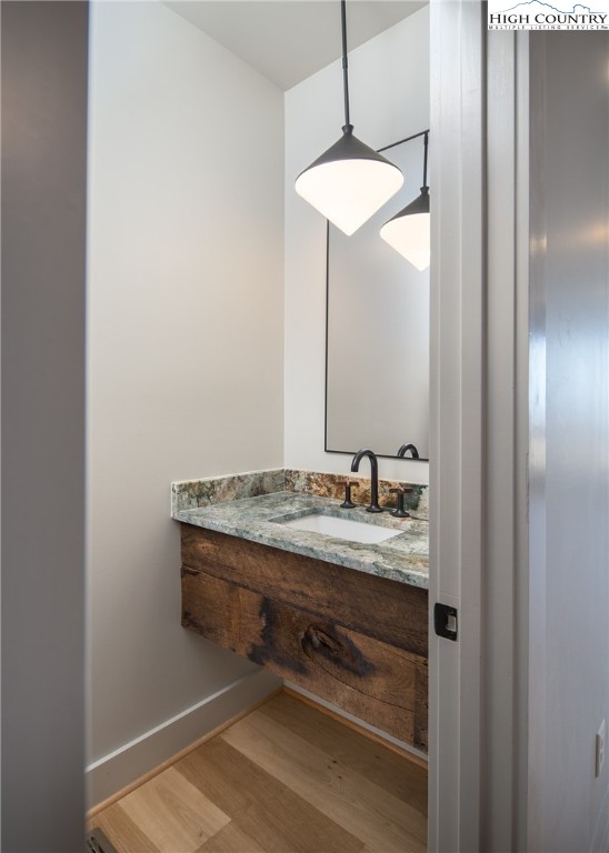 371 Ninebark Road Boone, NC 28607 - Photo 26 of 41 a bathroom with a granite countertop sink and a mirror