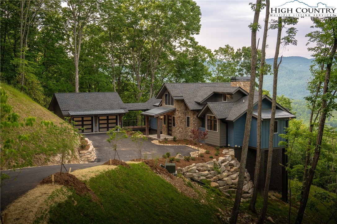 371 Ninebark Road Boone, NC 28607 - Photo 33 of 41 a view of a house with wooden fence