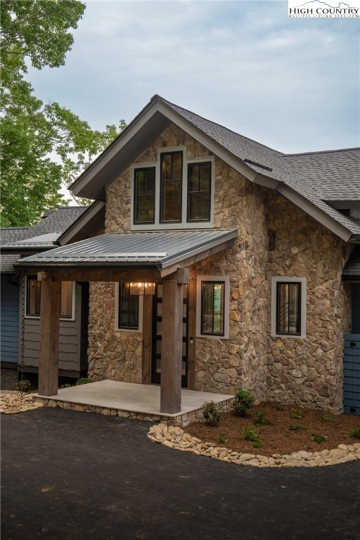 371 Ninebark Road Boone, NC 28607 - Photo 35 of 41 a front view of a house with a yard