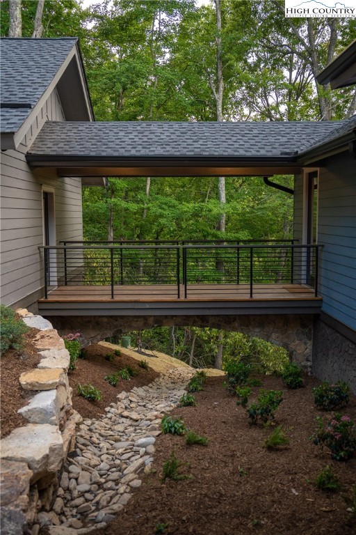 371 Ninebark Road Boone, NC 28607 - Photo 39 of 41 a view of a wooden deck with a yard