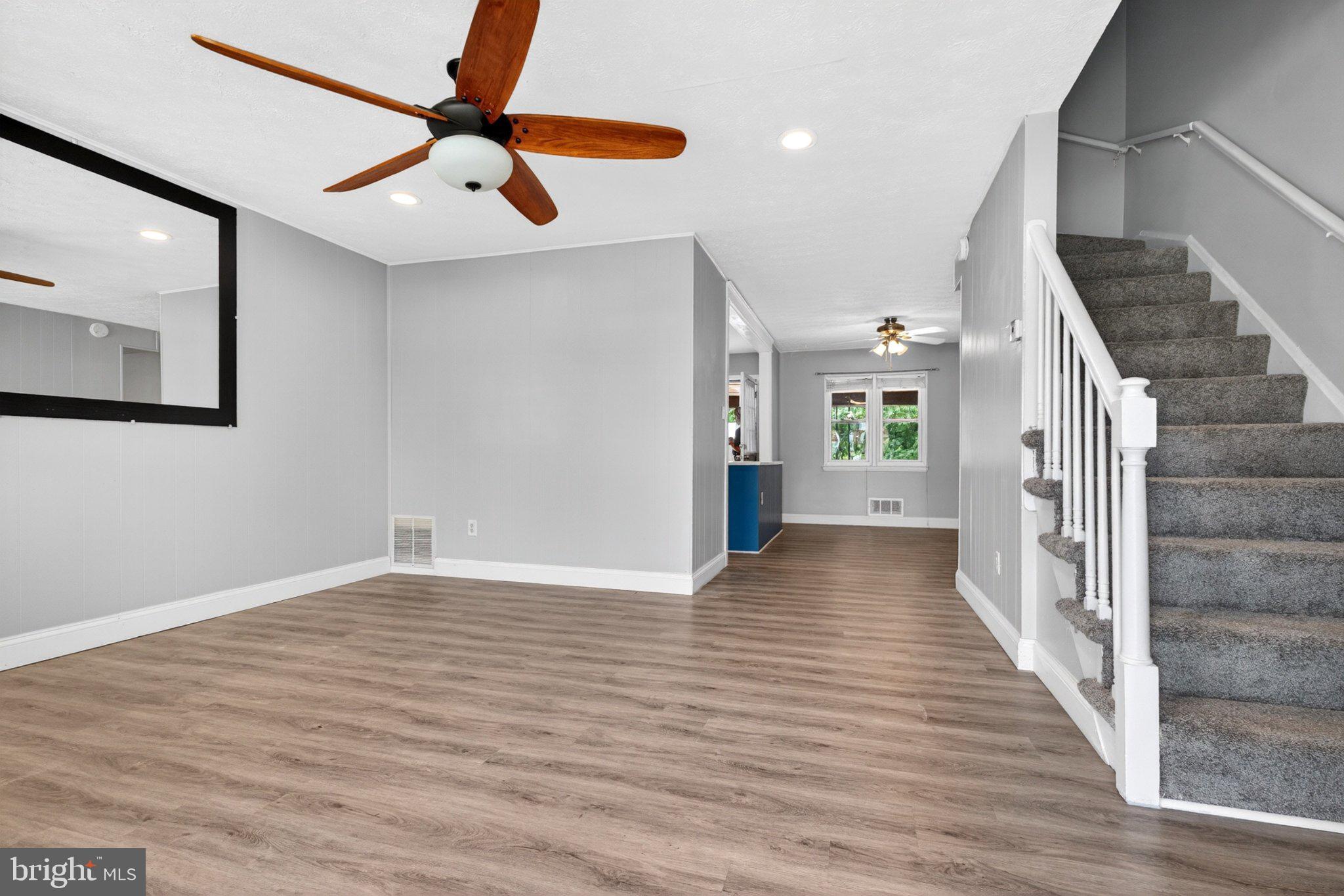 7729 Charlesmont Road Baltimore, MD 21222 - Photo 8 of 38 Spacious living area with modern flair.