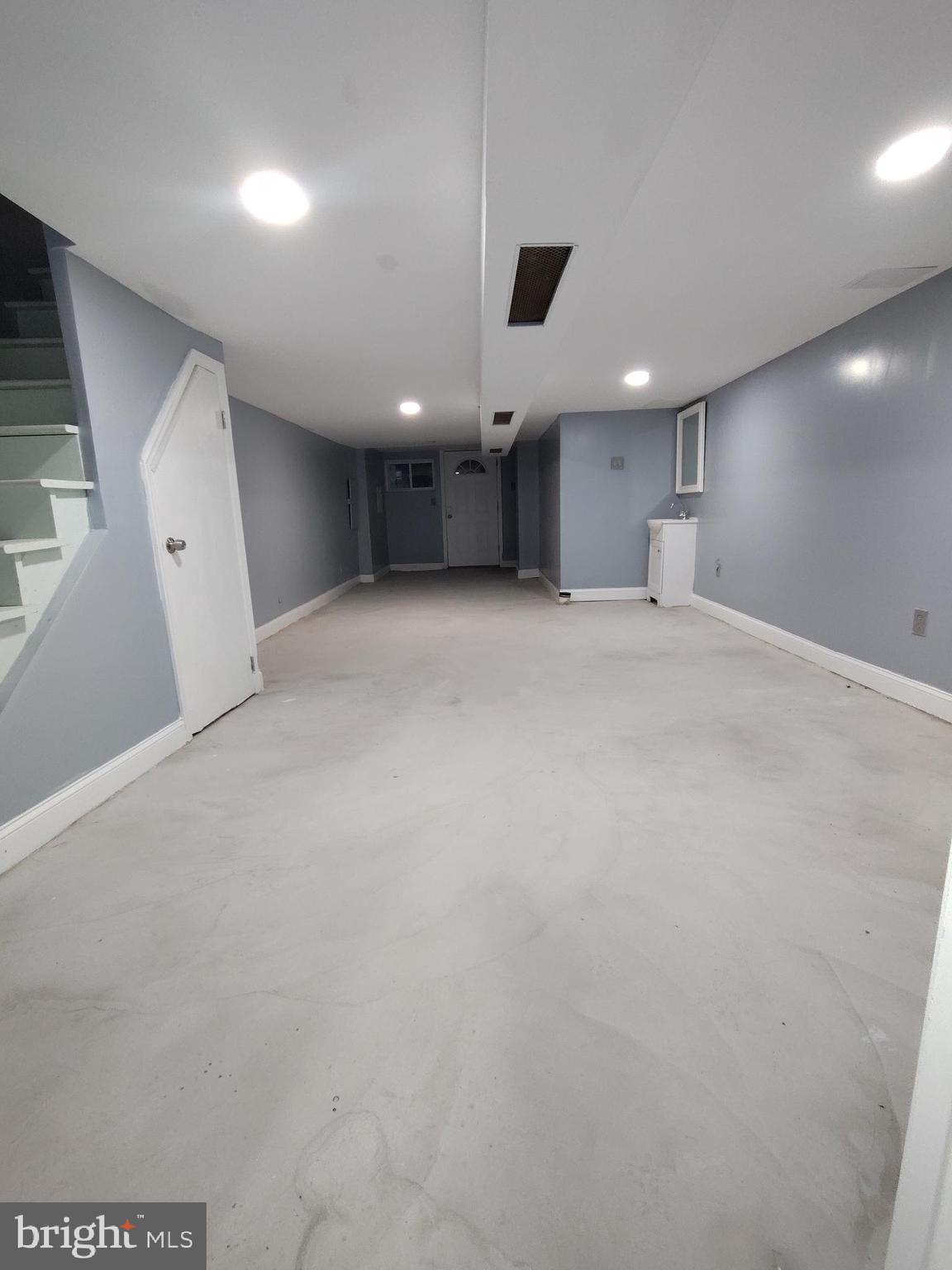 232 Copley Road Upper Darby, PA 19082 - Photo 17 of 21 a view of empty room with wooden floor